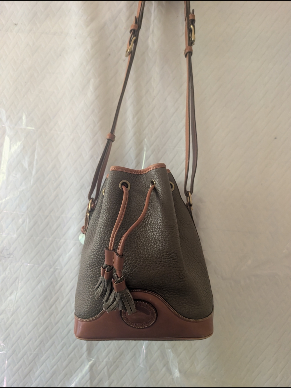 Dooney & Bourke Olive Green and Brown Pebbled Leather Drawstring Crossbody